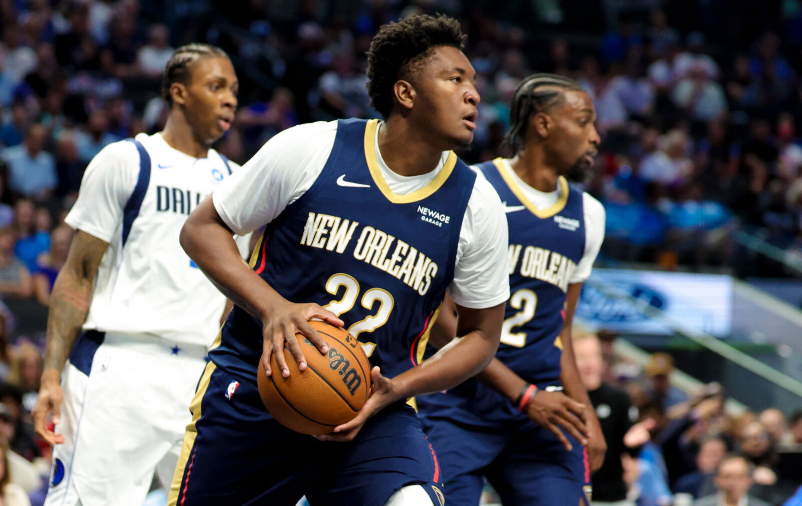 Oct 14, 2026; Dallas, Texas, USA; New Orleans Pelicans center Derik Queen (22) grabs the ball during the second quarter against the Dallas Mavericks at American Airlines Center. Mandatory Credit: Kevin Jairaj-Imagn Images