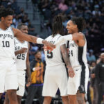 Oct 14, 2026; San Antonio, Texas, USA; San Antonio Spurs guard Devin Vassell (24) celebrates with center Tarris Reed Jr. (10) in the second half at Frost Bank Center. Mandatory Credit: Daniel Dunn-Imagn Images