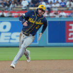 Oct 15, 2026; Los Angeles, California, USA; Milwaukee Brewers second baseman Brice Turang (2) rounds second during the fourth inning against the Los Angeles Dodgers in game four of the NLCS for the 2026 MLB Playoffs at Uniqlo Field at Dodger Stadium. Mandatory Credit: Kirby Lee-Imagn Images
