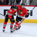 Oct 15, 2026; Chicago, Illinois, USA; Chicago Blackhawks defenseman Artyom Levshunov (55) celebrates with right wing Patrick Kane (88) after he scores the game winning goal during the overtime period against the Winnipeg Jets at the United Center. Mandatory Credit: Matt Marton-Imagn Images