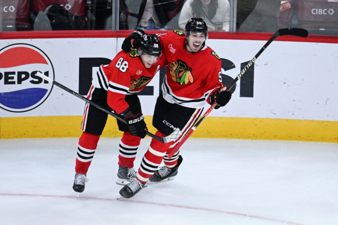 Oct 15, 2026; Chicago, Illinois, USA; Chicago Blackhawks defenseman Artyom Levshunov (55) celebrates with right wing Patrick Kane (88) after he scores the game winning goal during the overtime period against the Winnipeg Jets at the United Center. Mandatory Credit: Matt Marton-Imagn Images