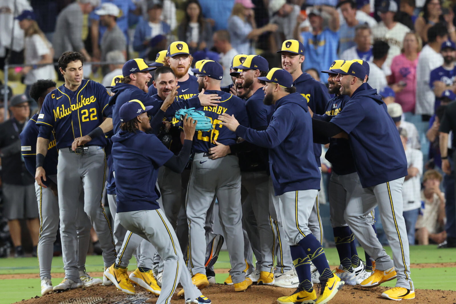 Oct 15, 2026; Los Angeles, California, USA; Milwaukee Brewers players celebrate winning the NLCS for the 2026 MLB Playoffs against the Los Angeles Dodgers at Uniqlo Field at Dodger Stadium. Mandatory Credit: Kiyoshi Mio-Imagn Images