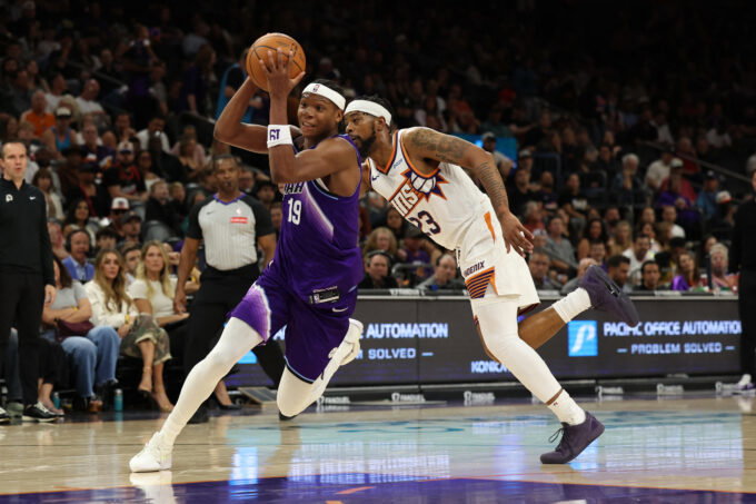 Oct 16, 2026; Phoenix, Arizona, USA; Utah Jazz forward Ace Bailey (19) dribbles against Phoenix Suns guard Jordan Goodwin (23) in the first half at Mortgage Matchup Center. Mandatory Credit: Anna Carrington-Imagn Images