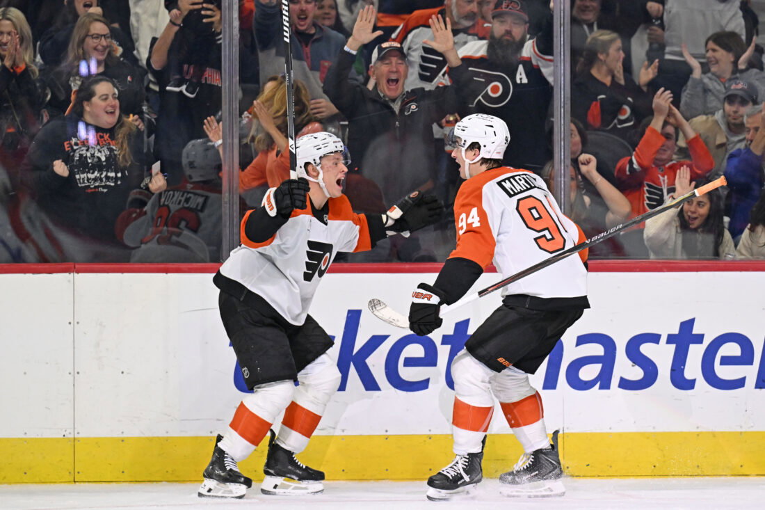 Oct 17, 2026; Philadelphia, Pennsylvania, USA; Philadelphia Flyers right wing Porter Martone (94) celebrates his goal with right wing Matvei Michkov (39) against the Ottawa Senators during the second period at Xfinity Mobile Arena. Mandatory Credit: Eric Hartline-Imagn Images