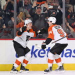Oct 17, 2026; Philadelphia, Pennsylvania, USA; Philadelphia Flyers right wing Porter Martone (94) celebrates his goal with right wing Matvei Michkov (39) against the Ottawa Senators during the second period at Xfinity Mobile Arena. Mandatory Credit: Eric Hartline-Imagn Images
