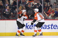 Oct 17, 2026; Philadelphia, Pennsylvania, USA; Philadelphia Flyers right wing Porter Martone (94) celebrates his goal with right wing Matvei Michkov (39) against the Ottawa Senators during the second period at Xfinity Mobile Arena. Mandatory Credit: Eric Hartline-Imagn Images