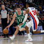 Oct 20, 2026; Detroit, Michigan, USA; Boston Celtics guard Payton Pritchard (11) dribbles defended by Detroit Pistons guard Daniss Jenkins (24) in the second half at Little Caesars Arena. Mandatory Credit: Rick Osentoski-Imagn Images