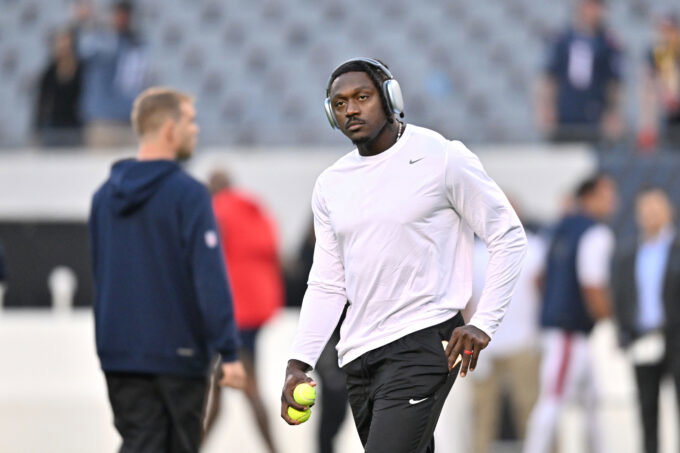 Oct 22, 2026; Chicago, Illinois, USA; New England Patriots wide receiver A.J. Brown (1) warms up prior to the game against the Chicago Bears at Soldier Field. Mandatory Credit: Patrick Gorski-Imagn Images