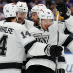 Oct 22, 2026; Elmont, New York, USA; Los Angeles Kings left wing Artemi Panarin (10) celebrates with teammates after scoring his second goal of the game against the New York Islanders during the first period at UBS Arena. Mandatory Credit: Brad Penner-Imagn Images