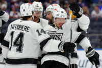 Oct 22, 2026; Elmont, New York, USA; Los Angeles Kings left wing Artemi Panarin (10) celebrates with teammates after scoring his second goal of the game against the New York Islanders during the first period at UBS Arena. Mandatory Credit: Brad Penner-Imagn Images
