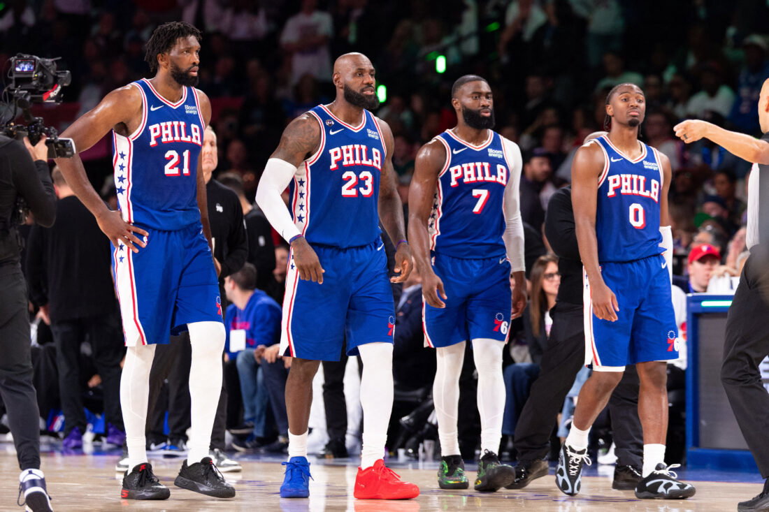 Oct 22, 2026; Philadelphia, Pennsylvania, USA; Philadelphia 76ers Joel Embiid (21) and LeBron James (23) and Jaylen Brown (7) and Tyrese Maxey (0) walk back on the court after a break in action against the Cleveland Cavaliers during the fourth quarter at Xfinity Mobile Arena. Mandatory Credit: Bill Streicher-Imagn Images