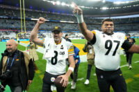 Oct 25, 2026; Paris, FRA; Pittsburgh Steelers quarterback Aaron Rodgers (8) and defensive tackle Cameron Heyward (97) wave to fans as they leave the field after defeating the New Orleans Saints at Stade de France Stadium. Mandatory Credit: Kirby Lee-Imagn Images