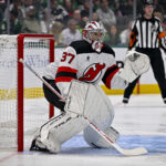Oct 27, 2026; Dallas, Texas, USA; New Jersey Devils goaltender Connor Hellebuyck (37) faces the Dallas Stars attack during the second period at the American Airlines Center. Mandatory Credit: Jerome Miron-Imagn Images