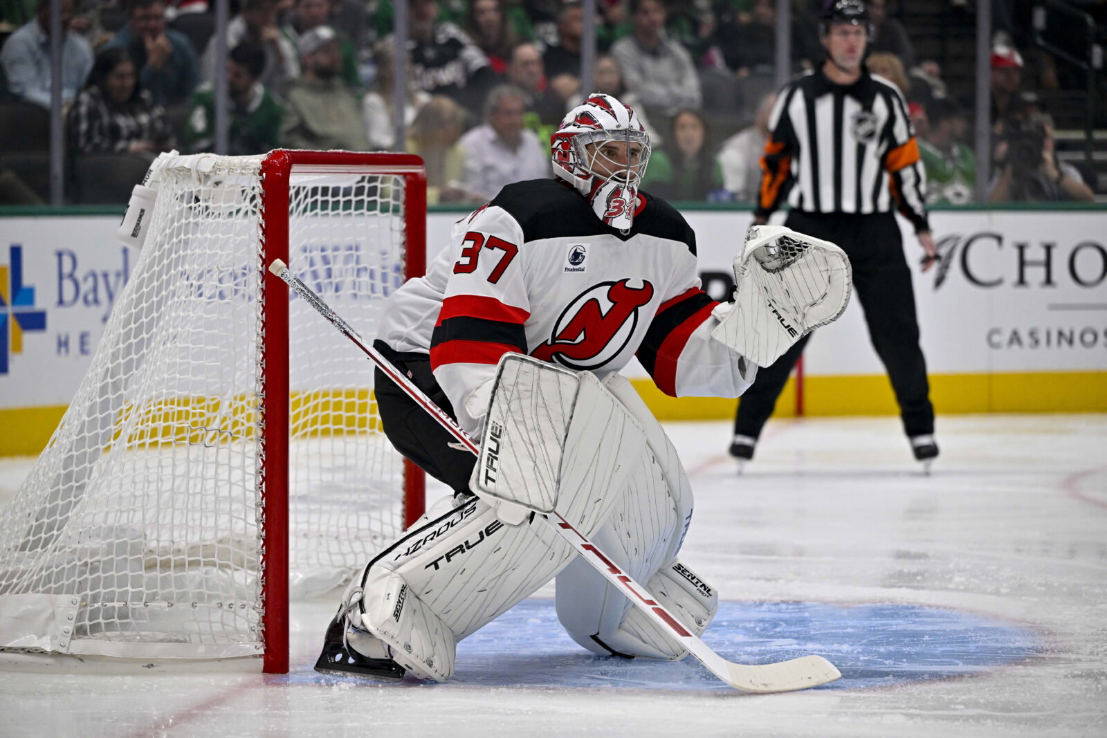 Oct 27, 2026; Dallas, Texas, USA; New Jersey Devils goaltender Connor Hellebuyck (37) faces the Dallas Stars attack during the second period at the American Airlines Center. Mandatory Credit: Jerome Miron-Imagn Images
