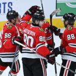 Oct 27, 2026; Chicago, Illinois, USA; Chicago Blackhawks right wing Roman Kantserov (80) celebrates with teammates after he scores a goal against the Los Angeles Kings during the second period at United Center. Mandatory Credit: Matt Marton-Imagn Images